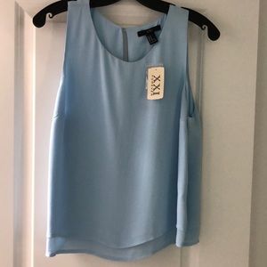XXII brand size M woven top in light blue